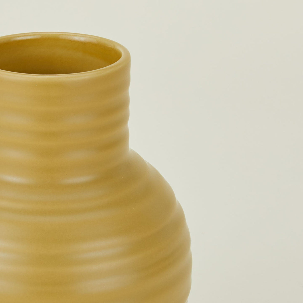Close up of Essential Ceramic Vase in Mustard.