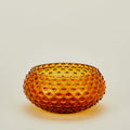 Glass hobnail amber serving bowl.