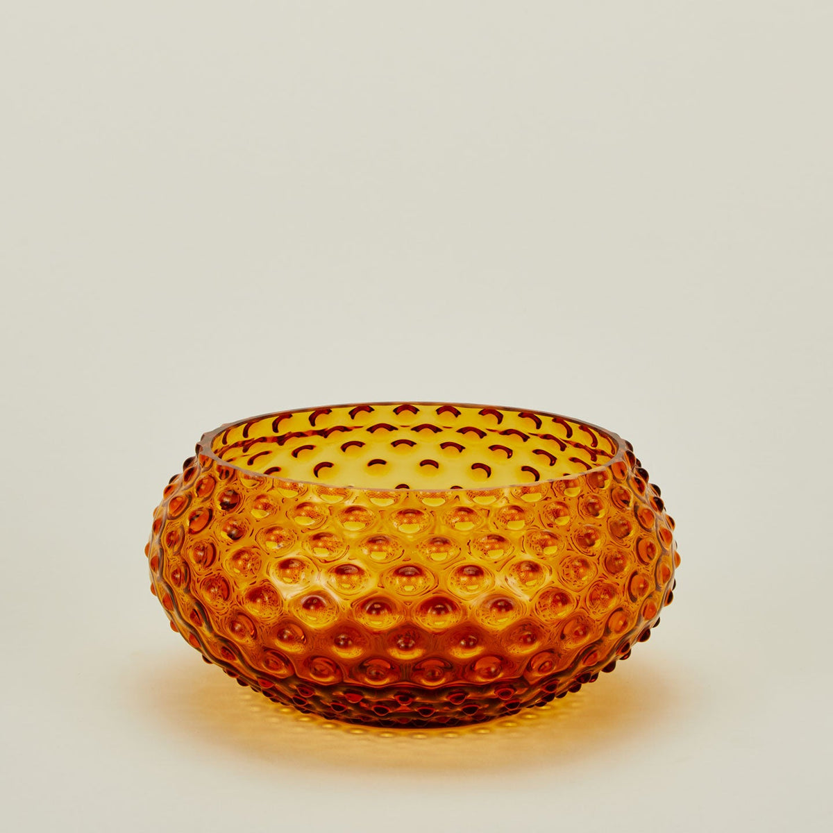 Glass hobnail amber serving bowl.