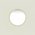 Round brass mirror.