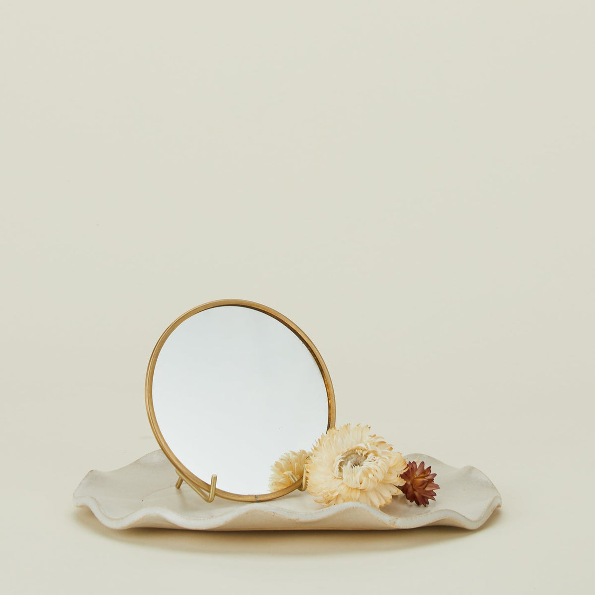 Round brass mirror.