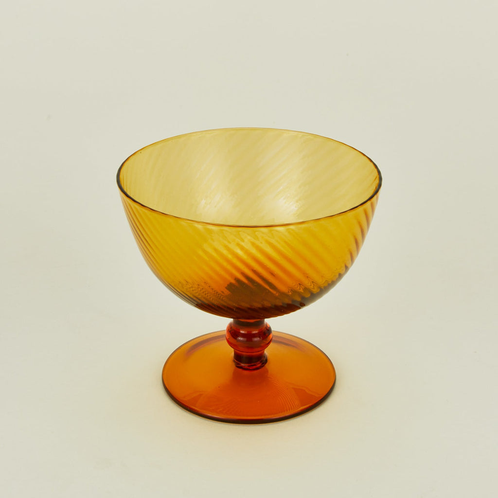 Detailed view of optic coupe in amber